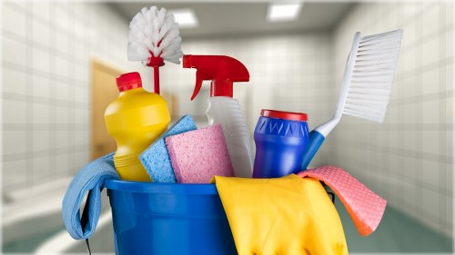 Professional home cleaners in NW3 working in a modern living room
