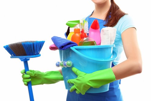 Commercial cleaners in NW3 sanitising a shared office area