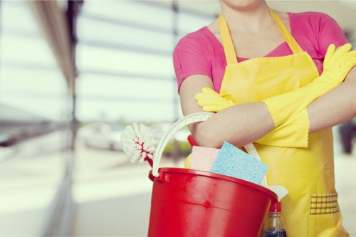 Cleaner preparing a furnished flat for tenancy handover in NW3