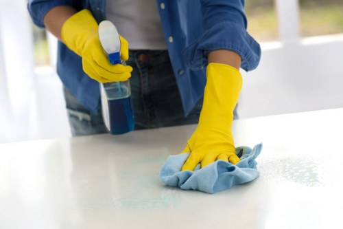 Supervisor checking cleaning records during a complaint review